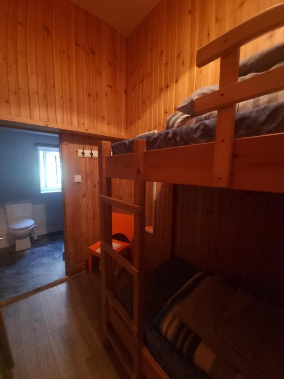 Postel nebo postele na pokoji v ubytování Blackwater Hostel