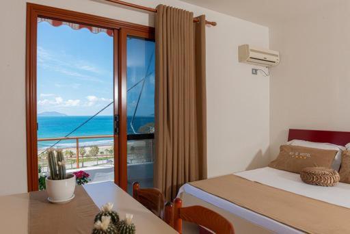 Postel nebo postele na pokoji v ubytování Hotel Idi