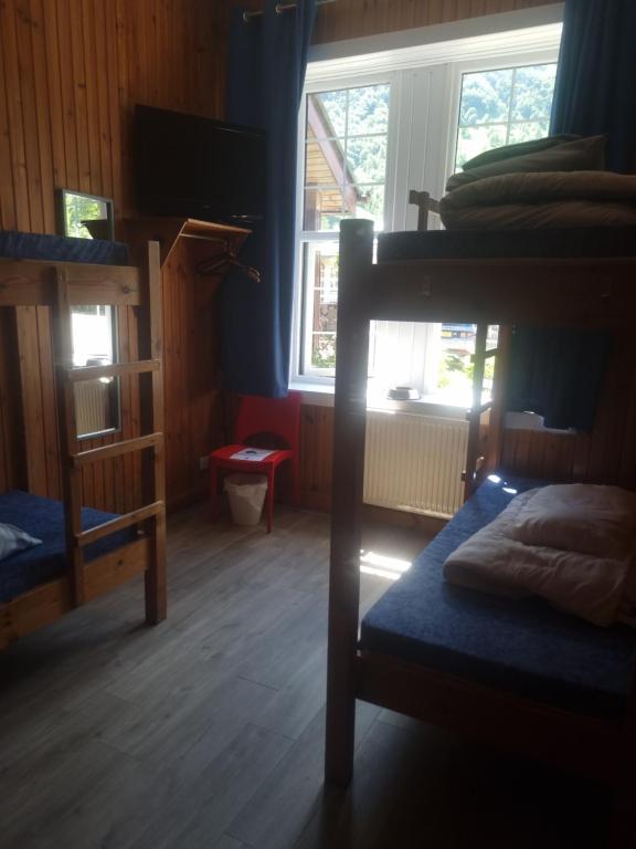 Postel nebo postele na pokoji v ubytování Blackwater Hostel
