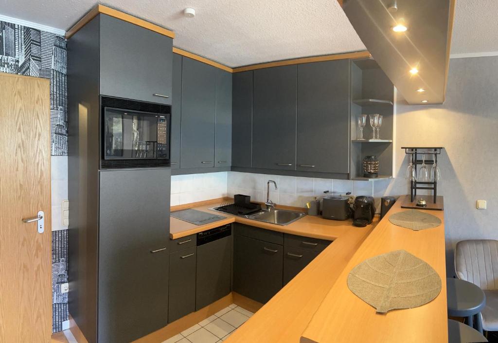 Kuchyň nebo kuchyňský kout v ubytování Apartment Studio Green line