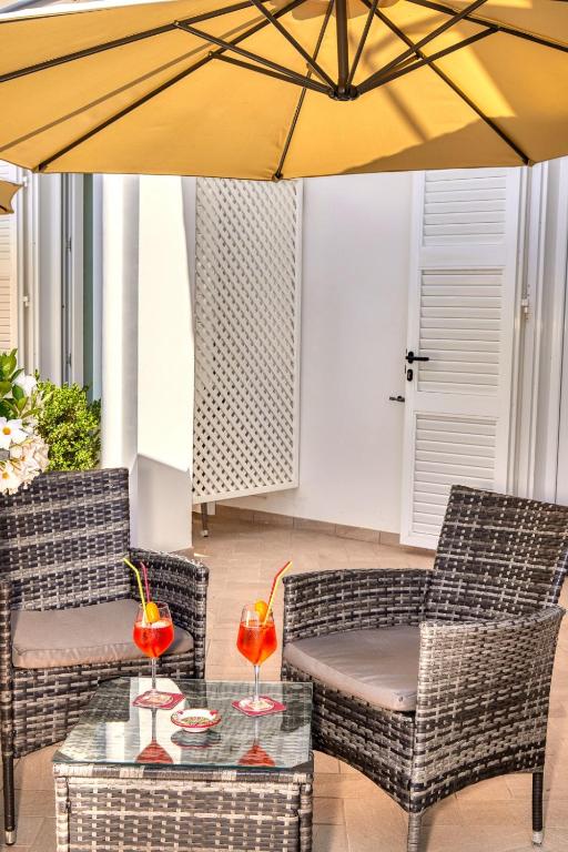 Posezení v ubytování Villa Giardini Luxury Room