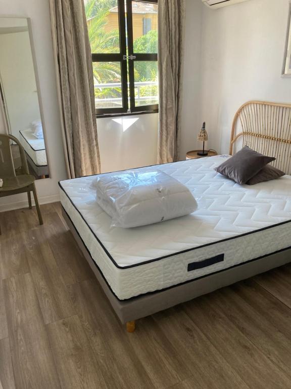 Een bed of bedden in een kamer bij Floreva