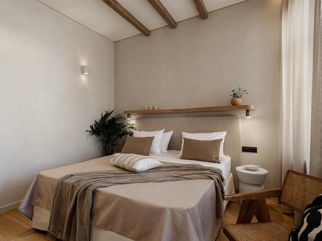 Postel nebo postele na pokoji v ubytování Casa Modiano Boutique