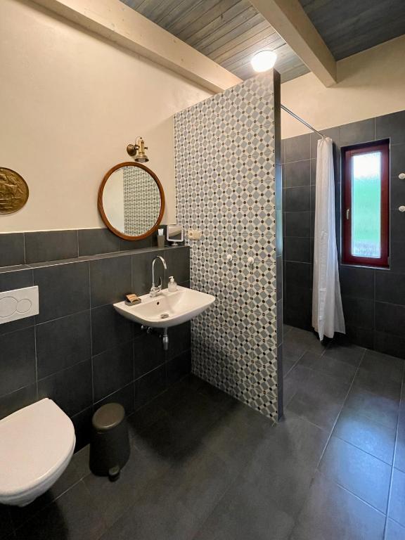 Koupelna v ubytování Apartmány Modřínový Dům