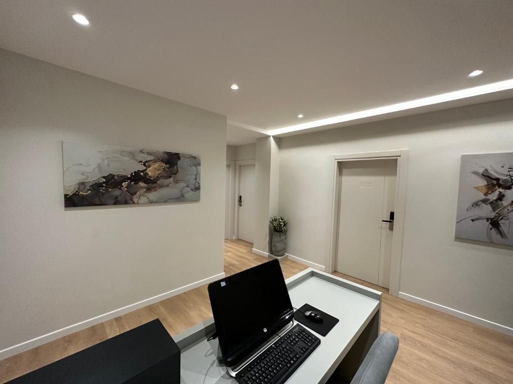 TV a/nebo společenská místnost v ubytování Soin Rooms