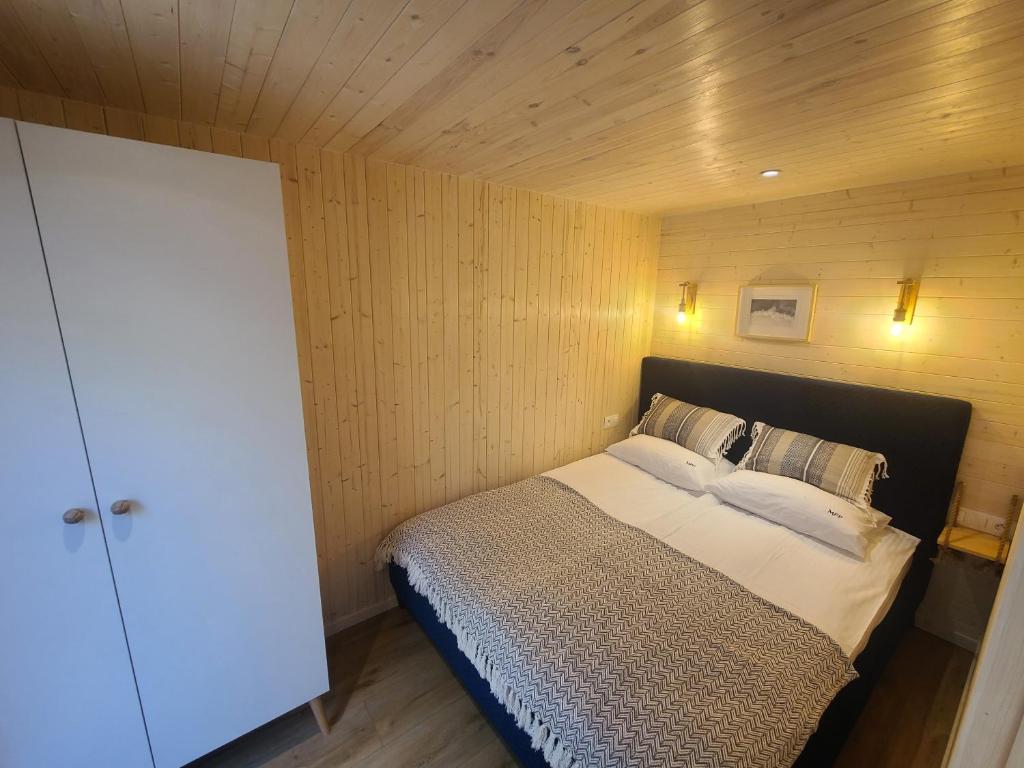 Postel nebo postele na pokoji v ubytování Morska Przystań Pilëce - Jacuzzi