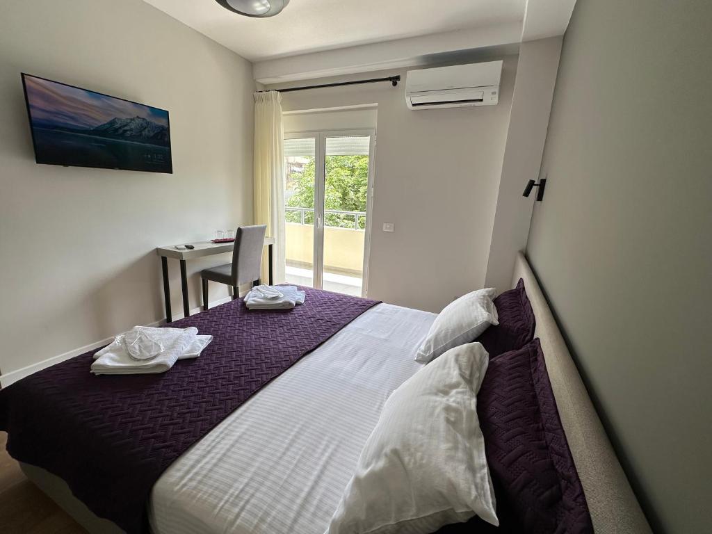 Postel nebo postele na pokoji v ubytování Soin Rooms