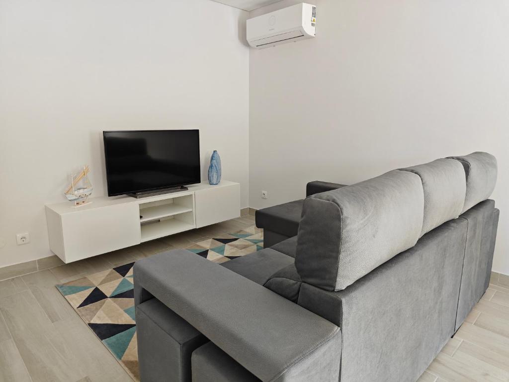 TV a/nebo společenská místnost v ubytování Alojamento King´s Village