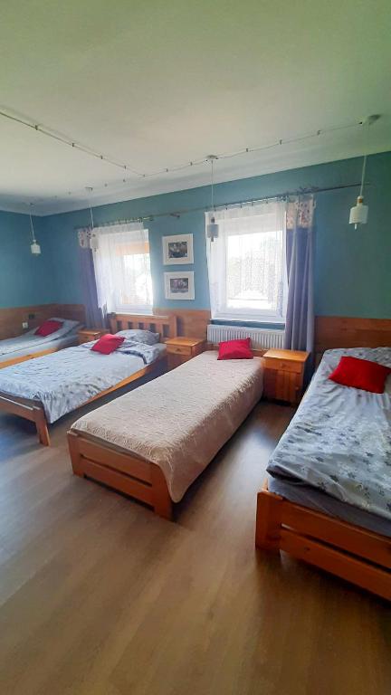 Posteľ alebo postele v izbe v ubytovaní Siedlisko Nad Toplami