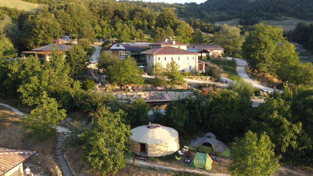 an aerial view of a house with a dome and a tent at Agriturismo Biologico Autosufficienza in Bagno di Romagna