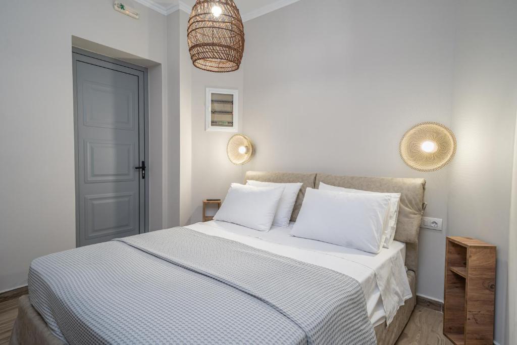 Postel nebo postele na pokoji v ubytování Maria Seaside Apartment