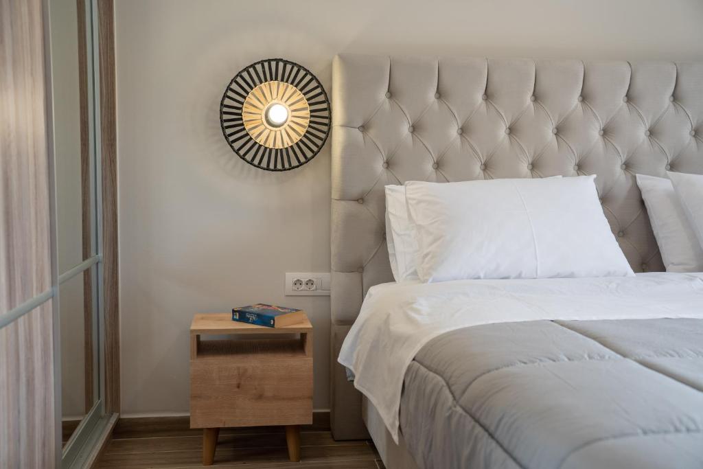 Postel nebo postele na pokoji v ubytování Maria Seaside Apartment