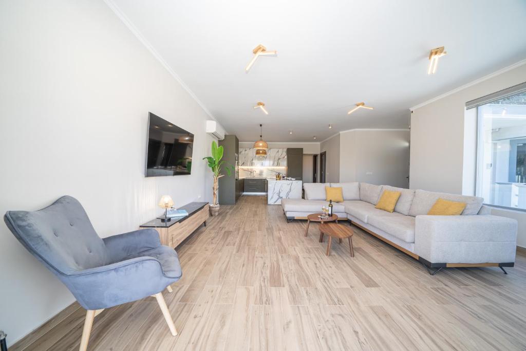 Posezení v ubytování Maria Seaside Apartment
