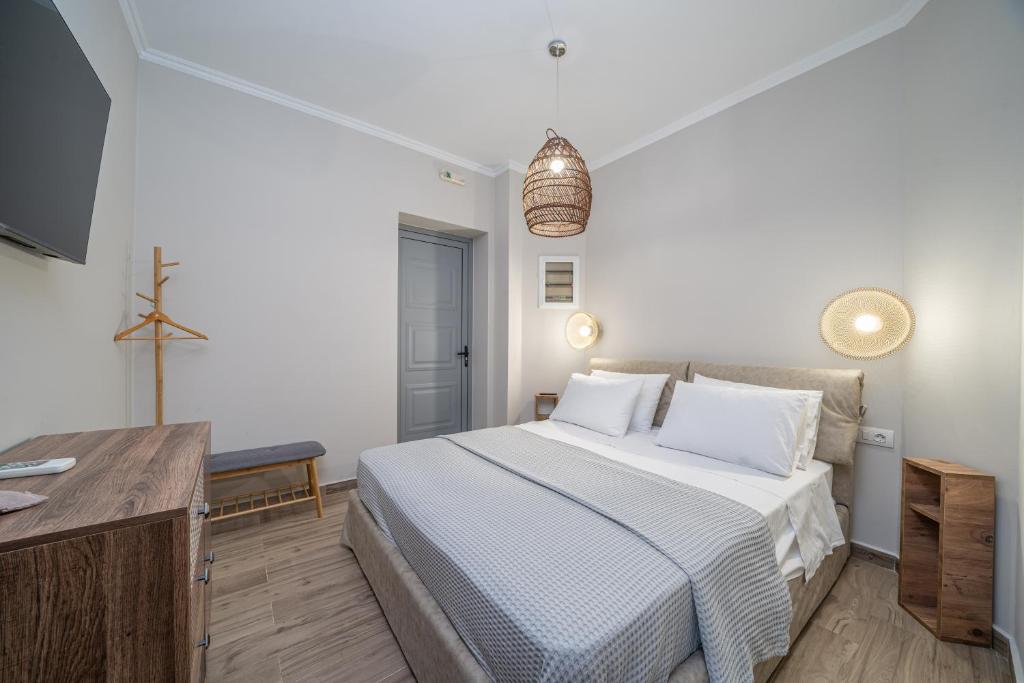 Postel nebo postele na pokoji v ubytování Maria Seaside Apartment