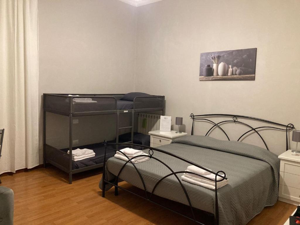 Postel nebo postele na pokoji v ubytování B&B Home XIX