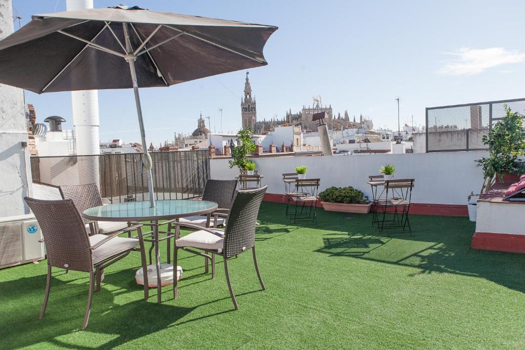 En balkong eller terrasse på Reservaloen Terrazas de la Catedral