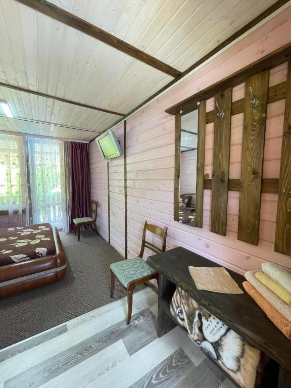 Postel nebo postele na pokoji v ubytování Садиба Карпат