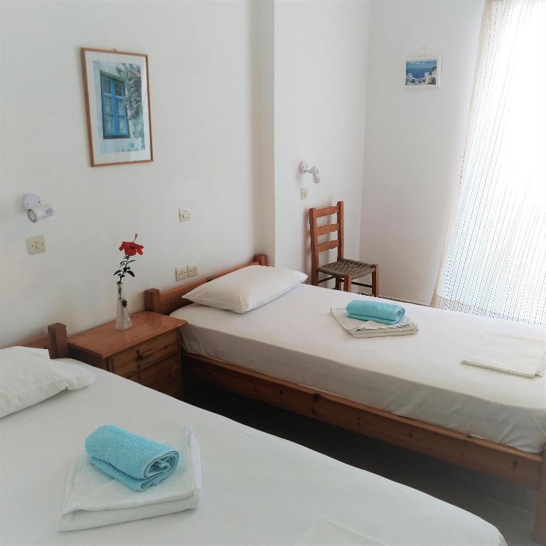 Postel nebo postele na pokoji v ubytování Dolphin Rooms
