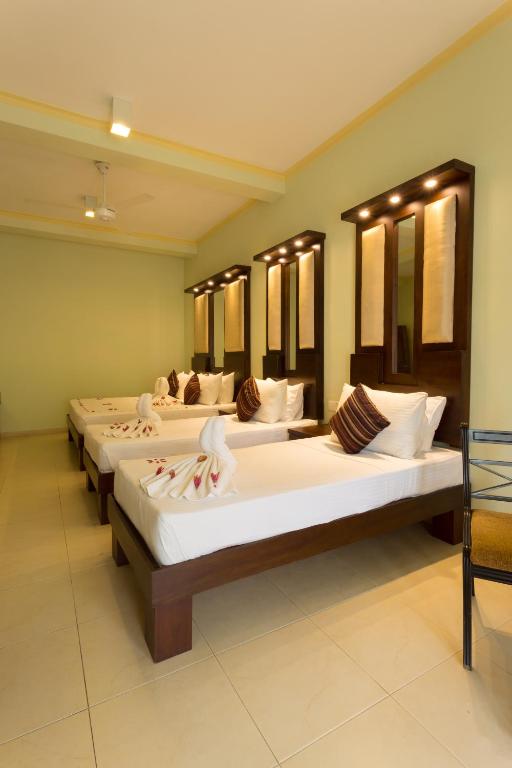 Oak Ray Serene Garden Hotel - Suite Familiar