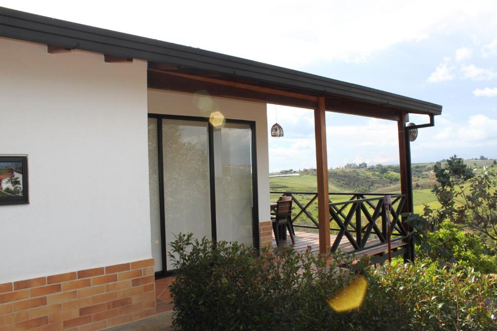 Balkón nebo terasa v ubytování Mesa De los Santos, Balcones De los Santos Cabaña Lounge Eucalipto
