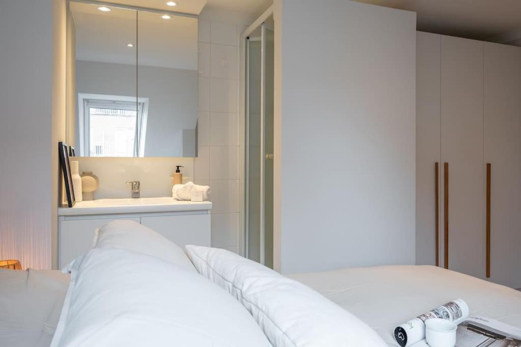Postel nebo postele na pokoji v ubytování Morgenzon luxueus appartement