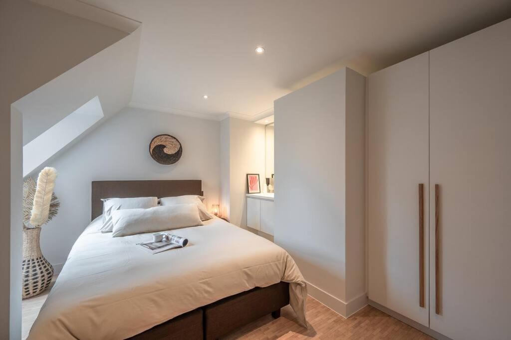 Postel nebo postele na pokoji v ubytování Morgenzon luxueus appartement