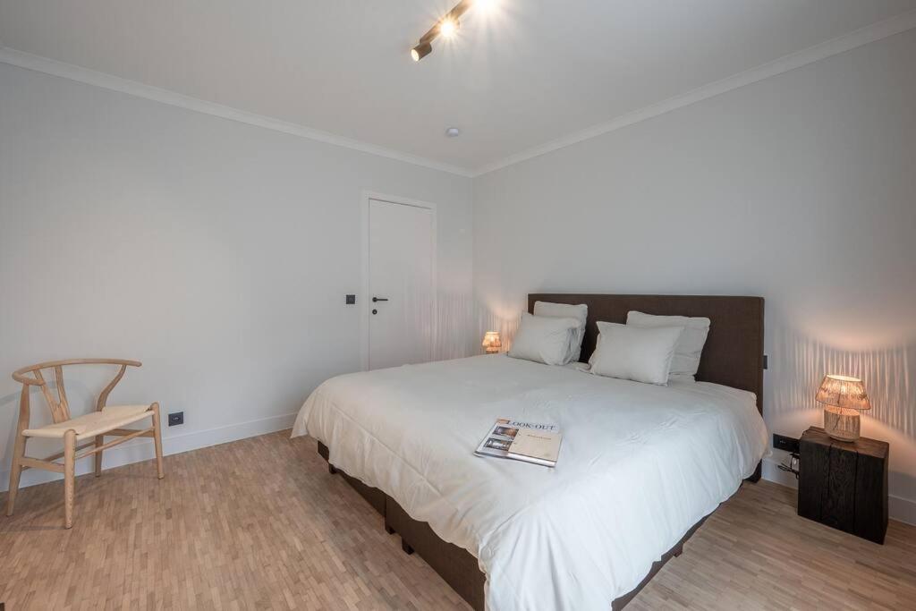 Postel nebo postele na pokoji v ubytování Morgenzon luxueus appartement