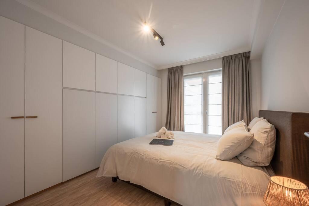 Postel nebo postele na pokoji v ubytování Morgenzon luxueus appartement