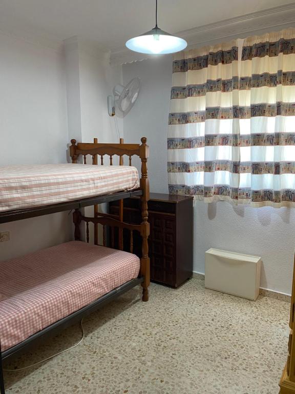 Posteľ alebo postele v izbe v ubytovaní ESPACIO Y LUZ en Isla Cristina Capacidad hasta 6 HUESPEDES