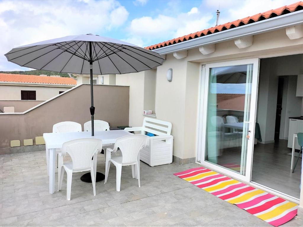 A patio or other outdoor area at Affittimoderni Castelsardo La Gemma
