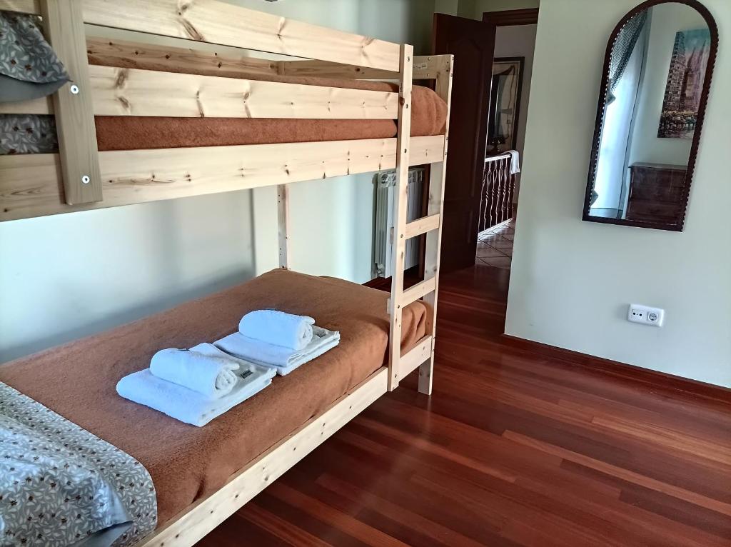 A bed or beds in a room at La Cariñosa