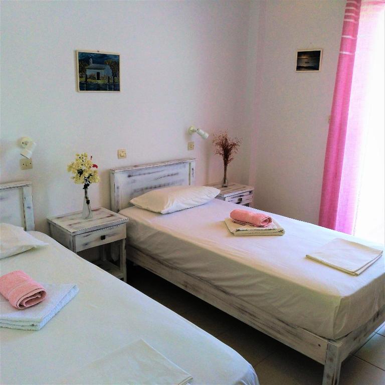 Postel nebo postele na pokoji v ubytování Dolphin Rooms