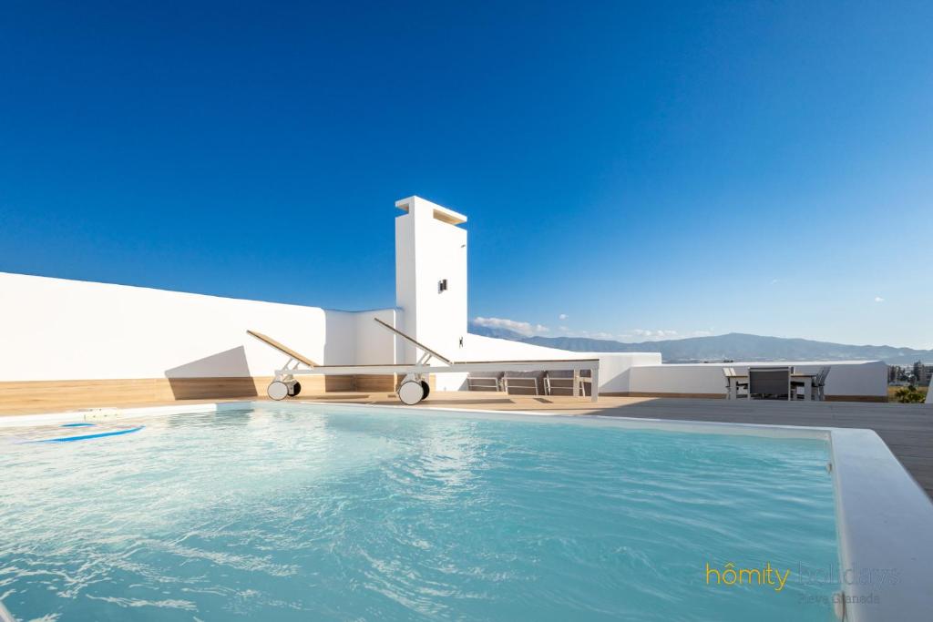 Bazén v ubytování Homity Holidays - Playa Granada - Mar de Astrid nebo v jeho okolí
