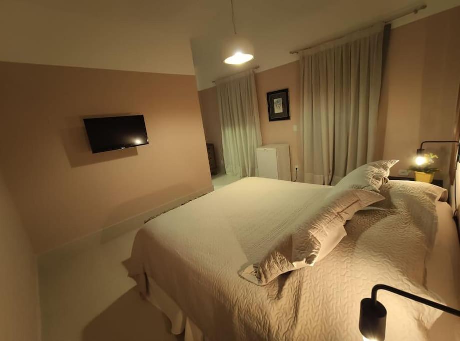 Säng eller sängar i ett rum på Melhor ponto de Bonito