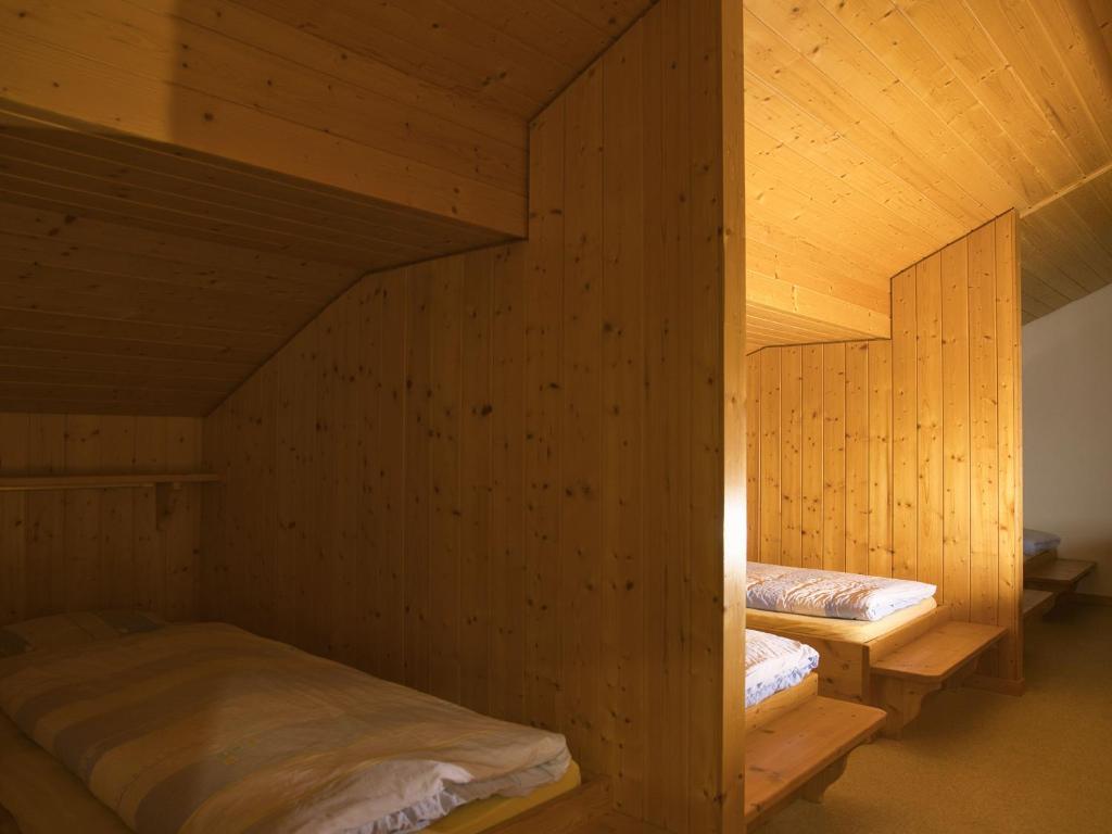 Postel nebo postele na pokoji v ubytování Hotel Aletschhorn