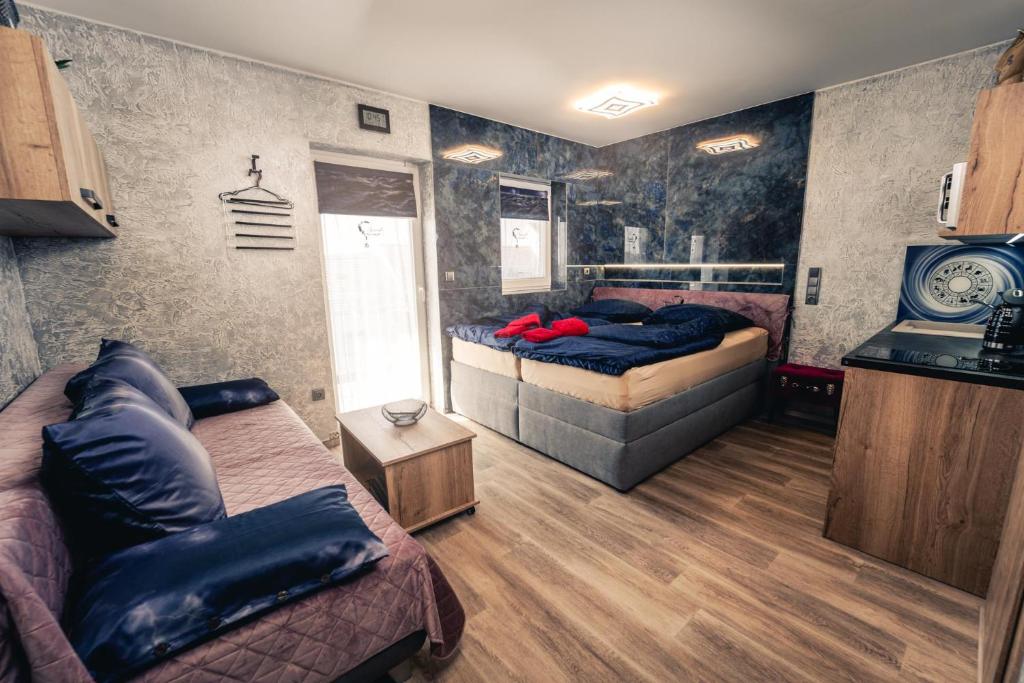 Postel nebo postele na pokoji v ubytování Penzion V Hádance