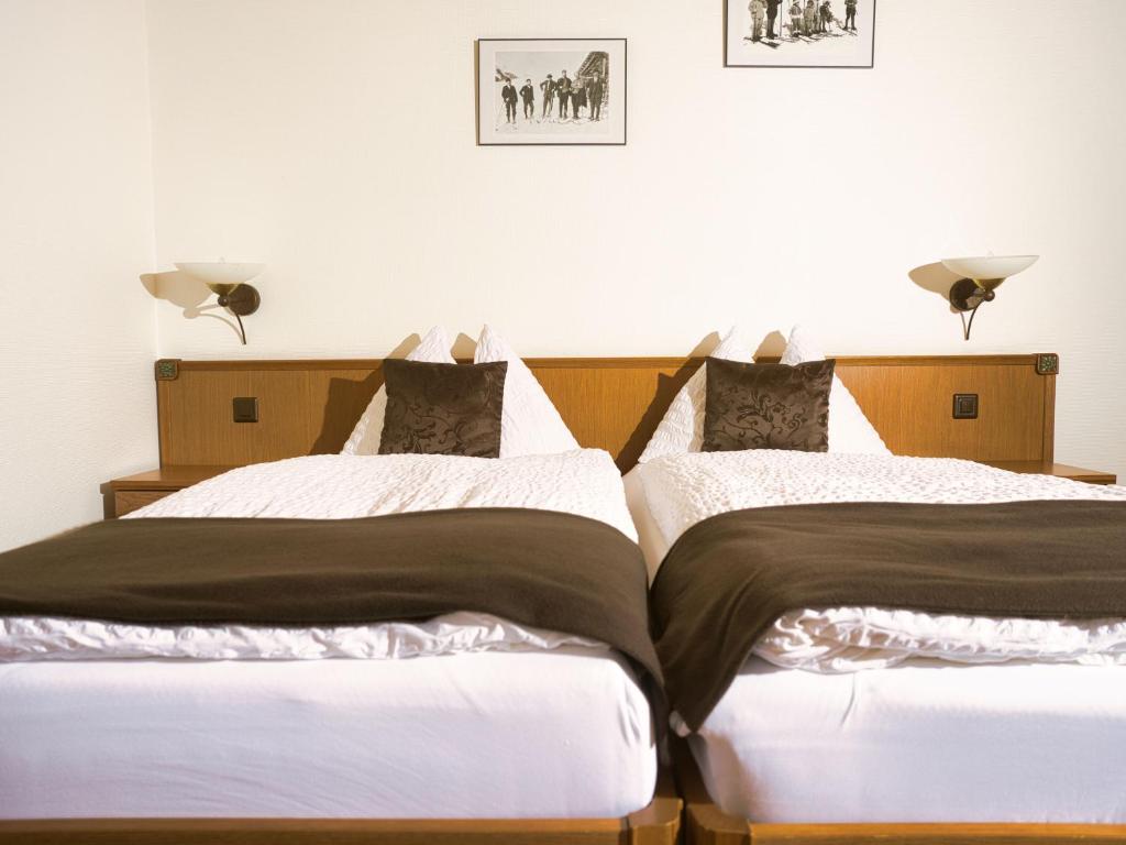 Postel nebo postele na pokoji v ubytování Hotel Massa