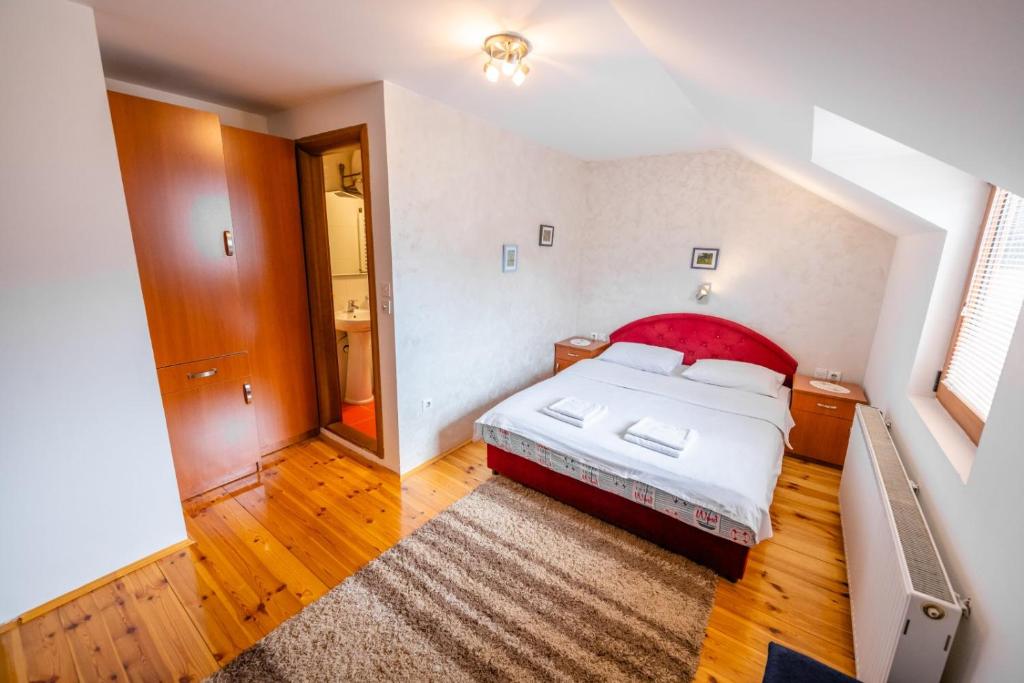 Postel nebo postele na pokoji v ubytování Guesthouse Sandra
