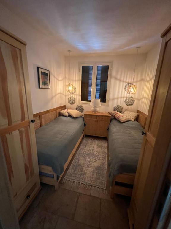 Posteľ alebo postele v izbe v ubytovaní Appartamento Porto Rotondo Rudargia