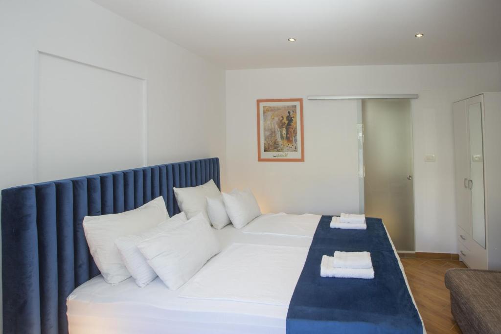 Postel nebo postele na pokoji v ubytování Guest House Kušeta