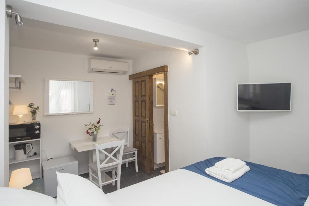 Postel nebo postele na pokoji v ubytování Guest House Kušeta