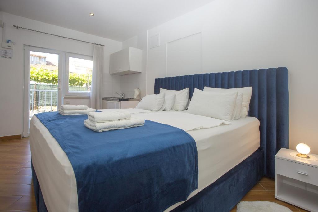 Postel nebo postele na pokoji v ubytování Guest House Kušeta