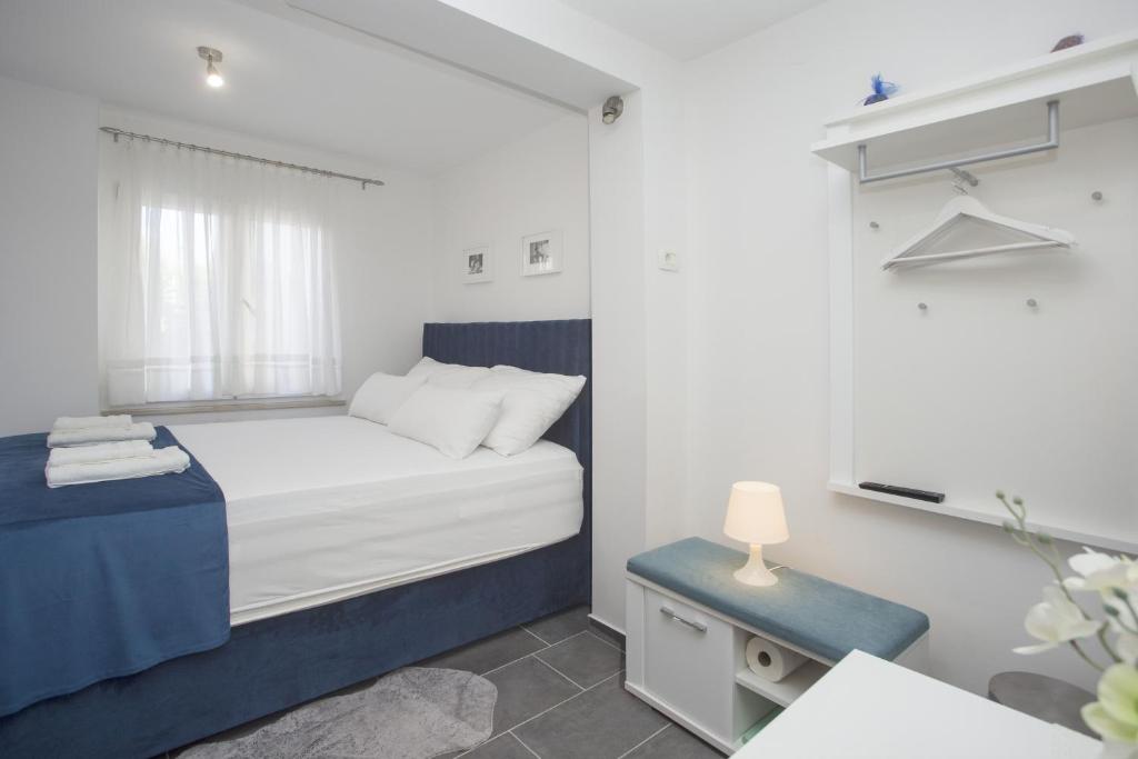 Postel nebo postele na pokoji v ubytování Guest House Kušeta
