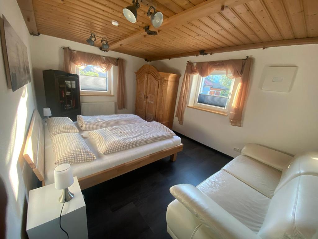 Postel nebo postele na pokoji v ubytování Ferienwohnung Wanderlust