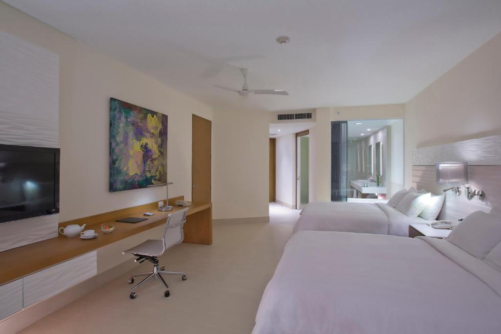 Postel nebo postele na pokoji v ubytování Krystal Grand Puerto Vallarta - All Inclusive
