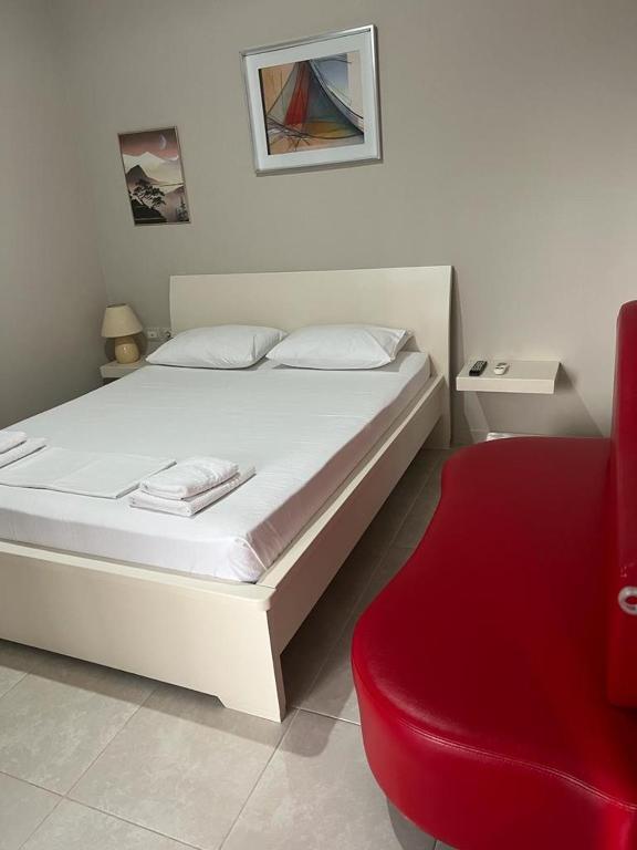Postel nebo postele na pokoji v ubytování Vila Mateo
