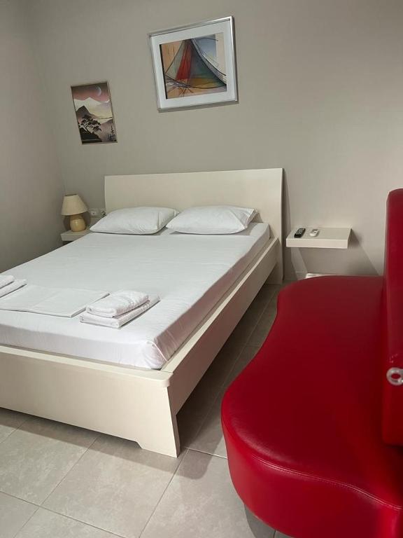 Postel nebo postele na pokoji v ubytování Vila Mateo