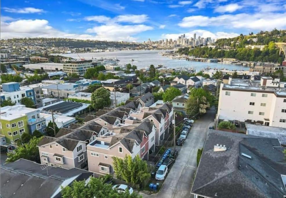 an aerial view of a city with a river and buildings at Fremont's stylish home-Lake Union view on Rooftop in Seattle