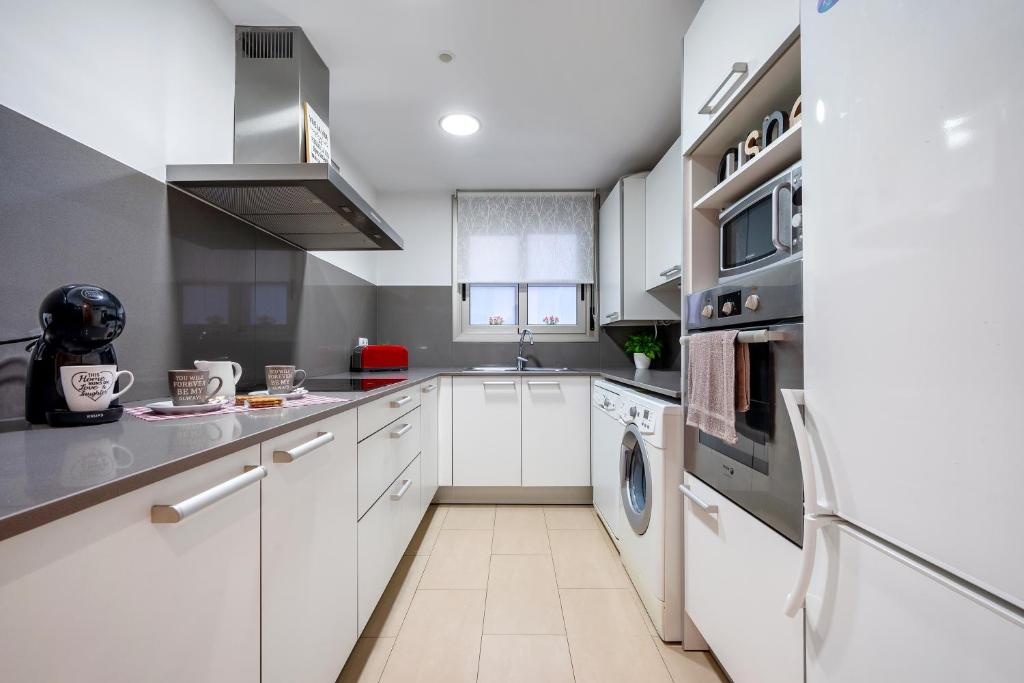 Kuchyň nebo kuchyňský kout v ubytování 1ª LÍNEA DE PLAYA. Apartamento: LA CALMA