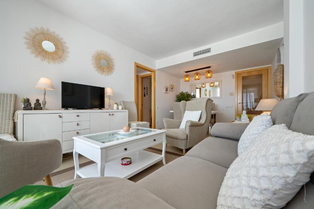 TV a/nebo společenská místnost v ubytování 1ª LÍNEA DE PLAYA. Apartamento: LA CALMA